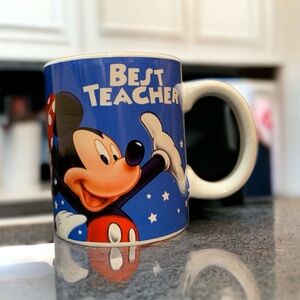 Best Teacher Disney Coffee Mug by Jerry Leigh